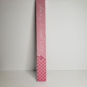 Pink wooden block with phrase "Love you Always". 200